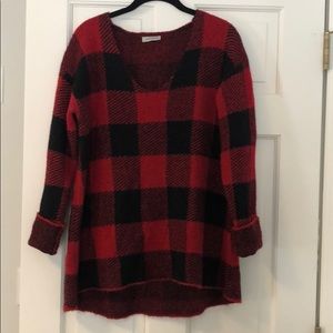 Red and black patterned sweater